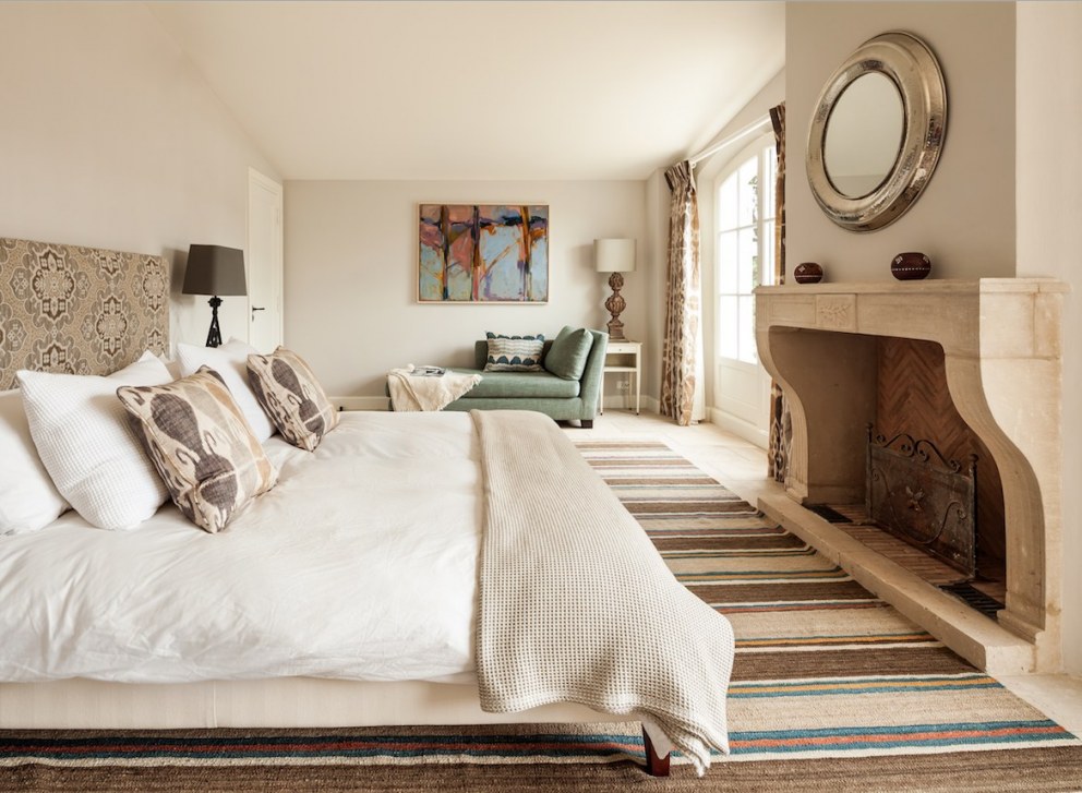 Cote D'Azur | Master bedroom with fire surround  | Interior Designers